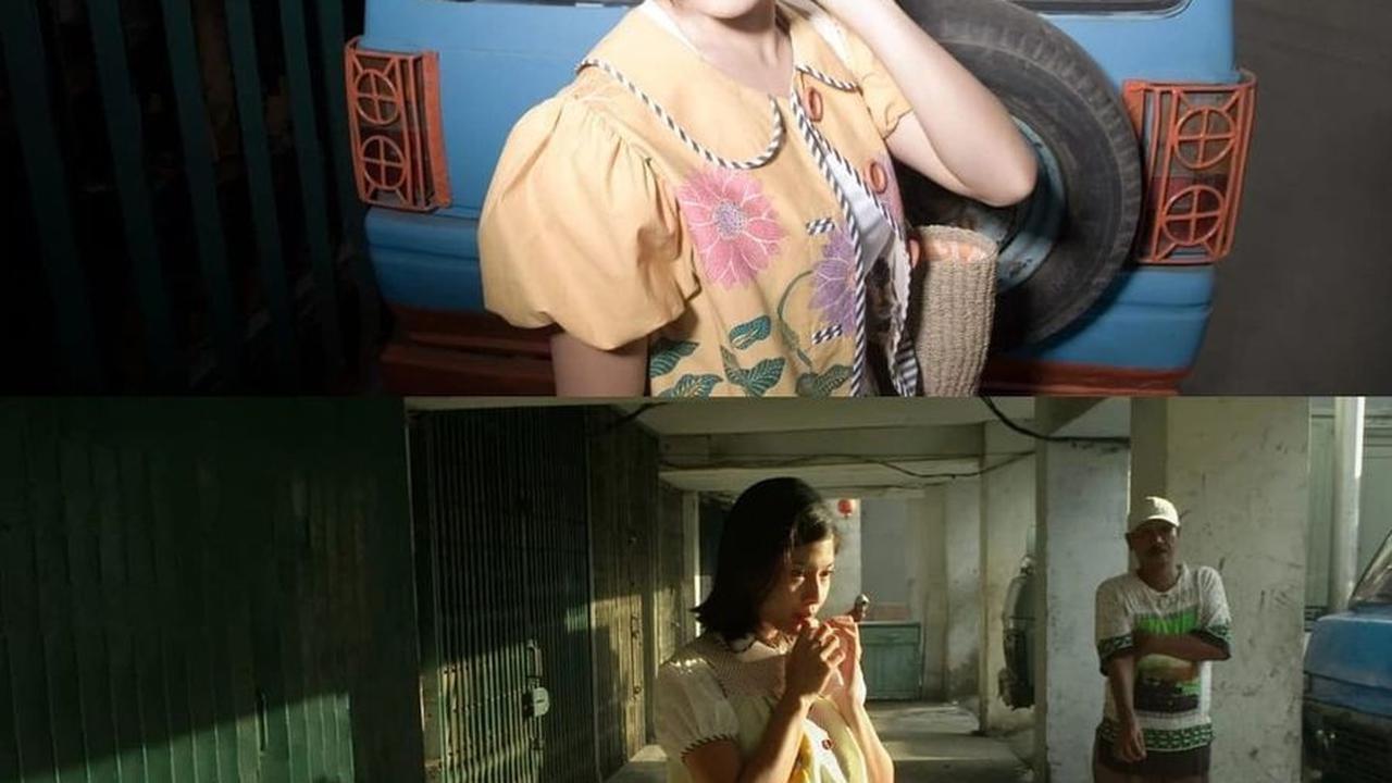 "Merayakan batik setiap hari, di mana saja. Selamat Hari Batik Nasional, postcards from 2006," tulis Dian Sastrowardoyo.