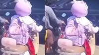 Seorang pelajar SD berpakaian seragam merah putih terekam tengah mengendarai sepeda listrik di jalan raya. (Liputan6.com/ Dok Warga: Desi Puri)