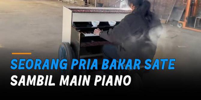 VIDEO: Seorang Pria Bakar Sate Sambil Main Piano, Unik Banget
