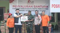 PT. Sentosa Laju Energi melalui yayasan SLE Foundation Peduli menyalurkan 600 paket sembako kepada ratusan warga terdampak kebakaran depo pertamina plumpang di posko koramil Tanah Merah Tanjung Priok Jakarta Utara (Istimewa)