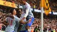 Para pemain Manchester United merayakan gol yang dicetak Mason Greenwood ke gawang Wolverhampton Wanderers pada lanjutan Liga Inggris 2021/2022. (OLI SCARFF / AFP)
