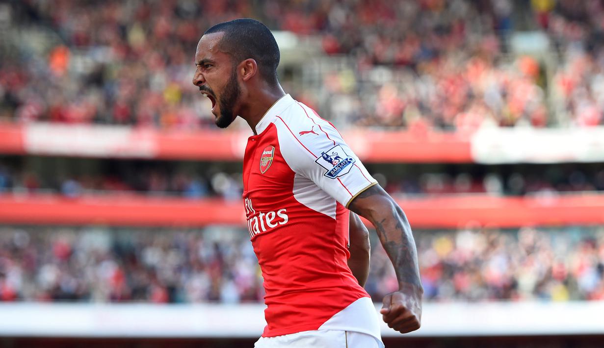 Ekspresi Theo Walcott setelah mencetak gol pertama Arsenal ke gawang Stoke City dalam lanjutan Liga Premier Inggris di Stadion Emirates, London. Sabtu (12/9/2015). (Reuters/Dylan Martinez)