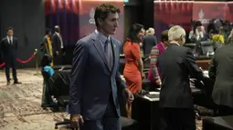 Perdana Menteri Kanada Justin Trudeau tiba untuk mengikuti pembukaan Konferensi Tingkat Tinggi atau KTT G20 hari pertama di Nusa Dua, Bali, Selasa (15/11/2022). (AP Photo/Dita Alangkara, Pool)