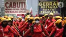 Massa yang tergabung dalam Gerakan Buruh Bersama Rakyat (GEBRAK) menggelar aksi dikawasan Patung Kuda, Jakarta, Senin (2/10/2023). (Liputan6.com/Faizal Fanani)