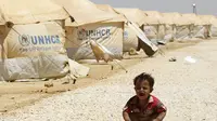 Seorang bocah tengah menangis di kamp pengungsi Suriah (Jordan Business Magazine)