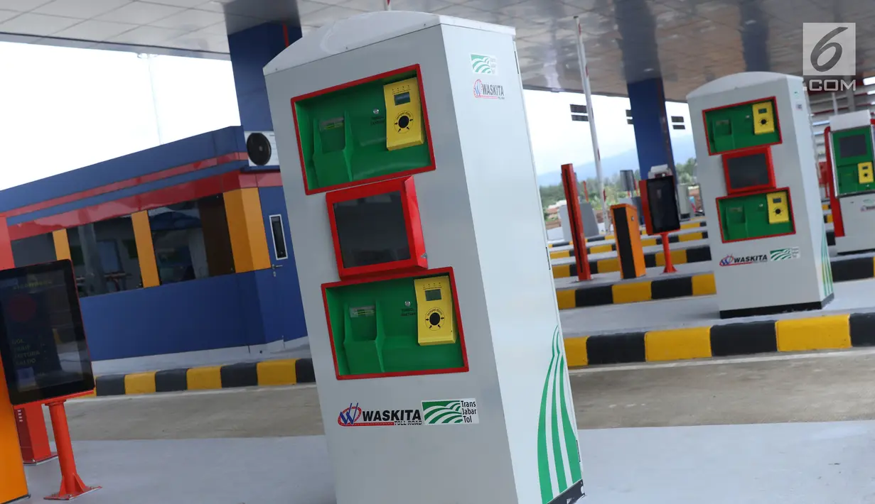Mesin pembayar elektronik terpasang di gerbang tol Cigombong I, Kab Bogor, Jawa Barat, Sabtu (1/12). Tol Ciawi-Sukabumi memiliki total panjang 54 Km dibagi menjadi empat seksi, Seksi I Ciawi-Cigombong 15,3 km. (Liputan6.com/Helmi Fithriansyah)