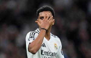 Selebrasi Rodrygo dalam laga Liga Champions antara Real Madrid vs Salzburg, Kamis (23/1/2025). (c) AP Photo/Manu Fernandez
