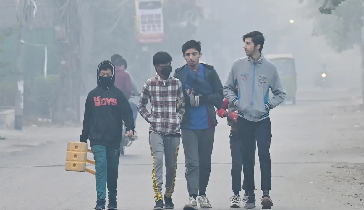 Kabut asap terus menyelimuti kota Lahore di Provinsi Punjab, Pakistan. (Arif ALI/AFP)