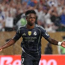 Vinicius Junior membuka keunggulan Real Madrid atas FC Salzburg di menit ke-40, FRANCK FIFE/AFP)