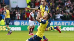 Aaron Ramsey menjadi pahlawan kemenangan Arsenal setelah mencetak gol di menit 12