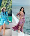 Off shoulder dress warna biru cerah yang senada dengan warna laut kolam renang dan laut jadi salah satu dress andalan Titi Kamal. [@titi_kamall]