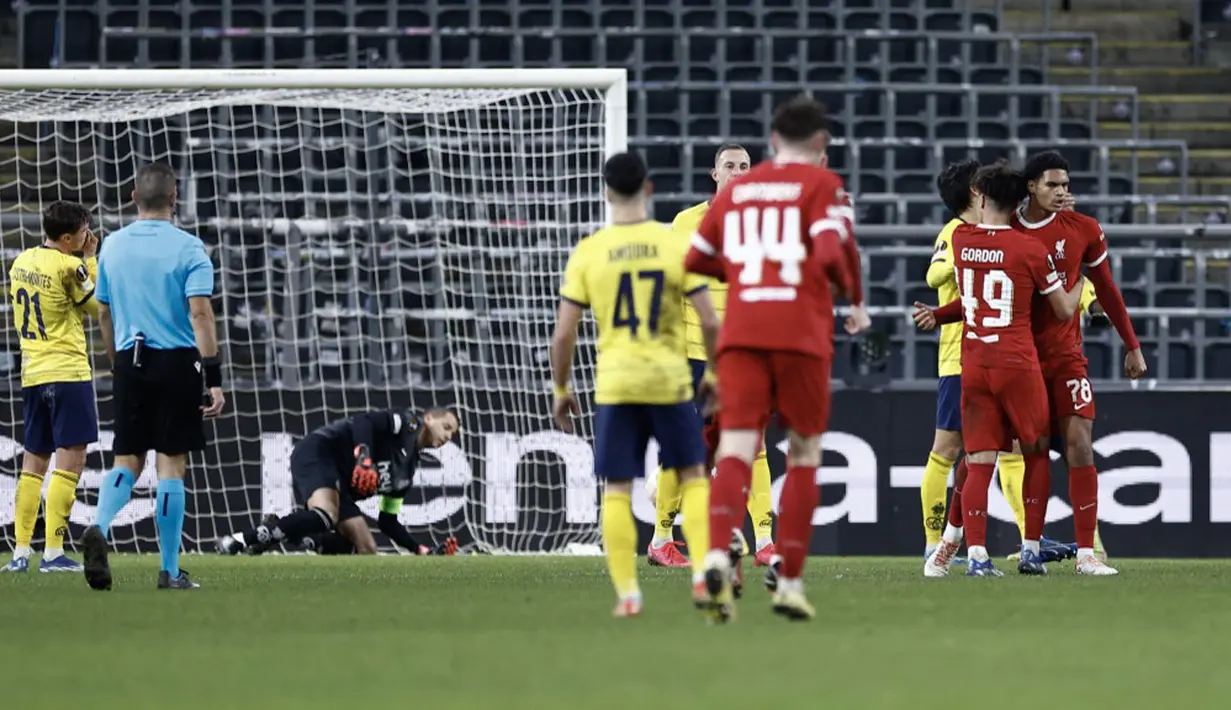 Liverpool sempat menyamakan skor lewat aksi Jarell Quansah. (Kenzo TRIBOUILLARD/AFP)