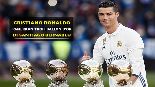 Bintang Real Madrid, Cristiano Ronaldo, pamerkan trofi Ballon d'Or keempat di stadion Santiago Bernabeu.