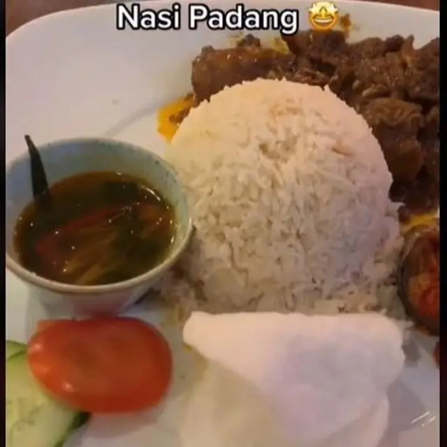 Pria Indonesia Menyantap Seporsi Nasi Padang di London, Berapa Harganya?