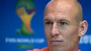   Arjen Robben mengaku sudah move on. Ia siap menampilkan permainan terbaiknya saat laga melawan Spanyol nanti, Brasil, Jumat (13/6/2014) (AFP Photo/LLUIS GENE).