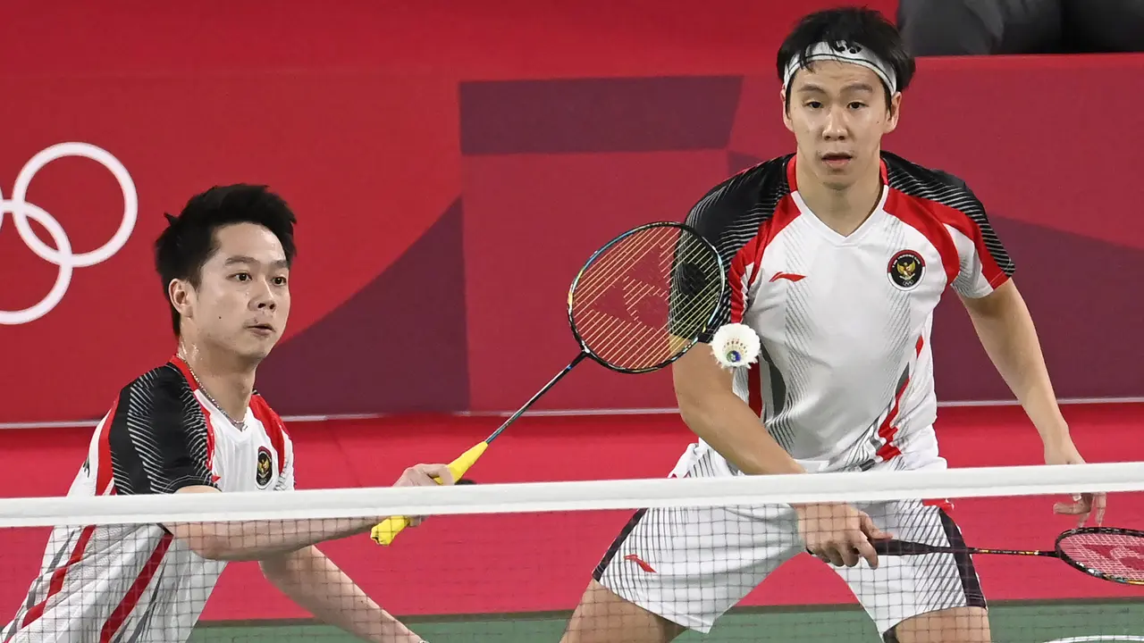 Foto: Kalahkan Pasangan India, Marcus/Kevin Melaju ke Babak Perempatfinal Bulu Tangkis Ganda Putra Olimpiade Tokyo 2020