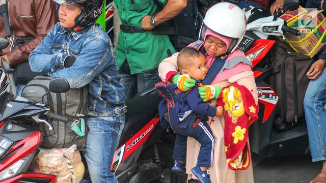 Potret Ekspresi Anak Pemudik di Pelabuhan Merak