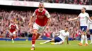 <p>Pemain Arsenal Granit Xhaka melakukan selebrasi usai mencetak gol ke gawang Tottenham Hotspur pada pertandingan sepak bola Liga Premier Inggris di Emirates Stadium, London, Inggris, 1 Oktober 2022. Arsenal menang 3-1. (AP Photo/Kirsty Wigglesworth)</p>