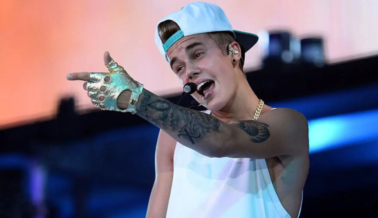 Sabtu (21/10/2017), Justin mengunggah sebuah video yang memperlihatkan koleksi tato terbaru di tubuhnya. Namun tatonya kali ini sepertinya lebih besar dan memang berukuran jumbo. (AFP/Ethan Miller)