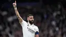 <p>Pemain Real Madrid Karim Benzema melakukan selebrasi usai mencetak gol ke gawang Liverpool pada pertandingan sepak bola leg kedua babak 16 besar Liga Champions di Stadion Santiago Bernabeu, Madrid, Spanyol, 15 Maret 2023. Real Madrid mengamankan tiket ke perempat final dengan agregat 6-2 atas Liverpool. (AP Photo/Bernat Armangue)</p>