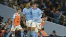 Di babak kedua Manchester City kembali menambah tiga gol lagi ke gawang Nottingham Forest. Gol keempat lahir hanya lima menit usai babak kedua dimulai. Joao Cancelo (kiri) berhasil mencetak gol lewat tendangan keras kaki kanan dari luar kotak penalti. (AP/Dave Thompson)