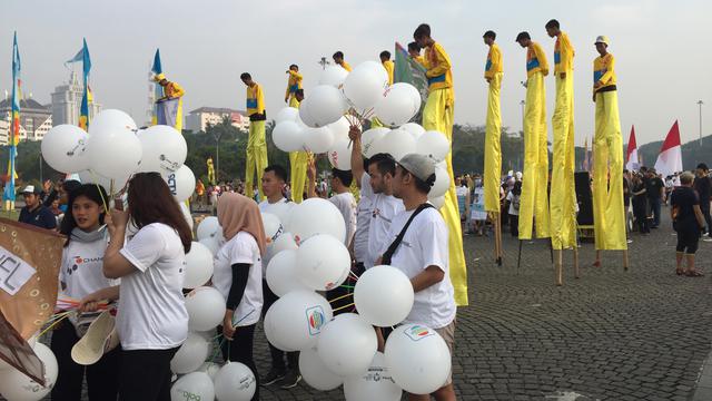 Pesaerta parade Asian Games yang digelar di Lapangan Silang Monas (Liputan6.com/Devira Prastiwi)