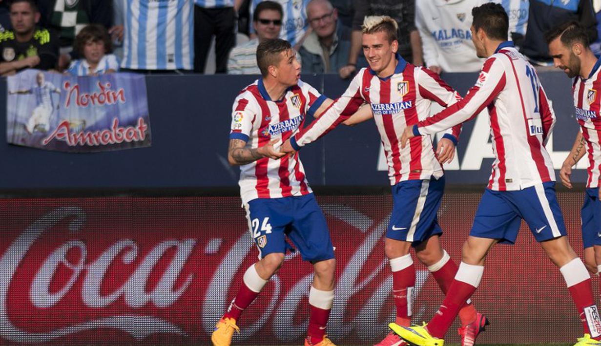 Selebrasi  Antoine Griezmann setelah sepakannya dari jarak dekat menghujam deras gawang Malaga yang dikawal Carlos Kameni.