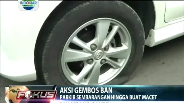 Aksi Gembos Ban, Mobil Pejabat Digembosi Polisi