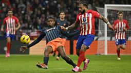Kemenangan Atletico Madrid atas Valencia sukses membuat Los Colchoneros menggeser Barcelona dari posisi ketiga klasemen LaLiga. (JAVIER SORIANO/AFP)