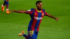 Penyerang Barcelona, Ansu Fati berselebrasi usai mencetak gol pembuka ke gawang Villarreal pada laga Liga Spanyol di Stadion Nou Camp, Senin (28/9/2020) dini hari. Barcelona menang telak dari Villarreal dengan skor 4-0. (AP Photo/Joan Monfort)