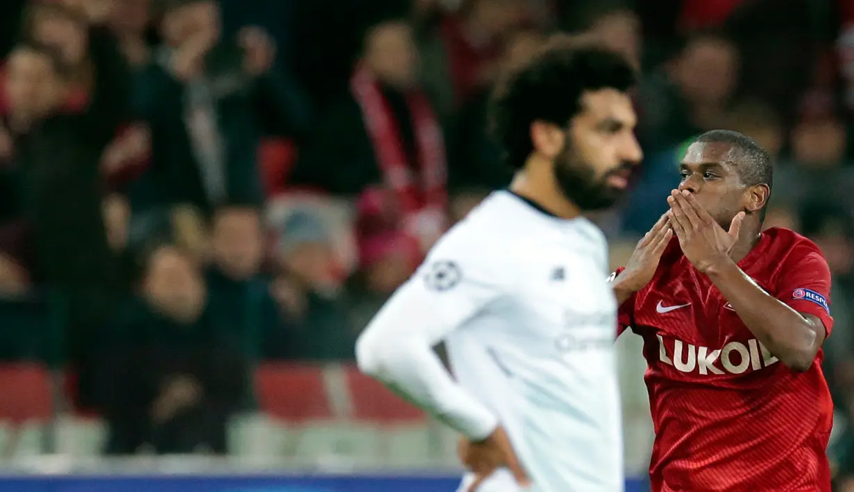 Pemain Spartak Moskow, Fernando berselebrasi setelah mencetak gol ke gawang Liverpool pada matchday 2 Grup E Liga Champions di Otkrytiye Arena, Rabu (27/9). Liverpool harus puas bermain imbang 1-1 di kandang Spartak Moskow. (AP /Ivan Sekretarev)
