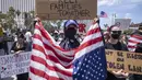 Ketika unjuk rasa berlangsung di berbagai kota, Presiden Trump diketahui sedang berada di Washington untuk menghadiri parade militer memperingati 250 tahun berdirinya Angkatan Darat, yang bertepatan dengan hari ulang tahunnya ke-79. (RINGO CHIU/AFP)