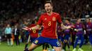 Gelandang Spanyol, Saul Niguez, merayakan hat-trick yang dicetaknya ke gawang Italia pada laga semifinal Piala Eropa U-21 di Stadion Miejski, Polandia, Selasa (27/6/2017). Spanyol menang 3-1 atas Italia. (AFP/Janek Skarzynski)