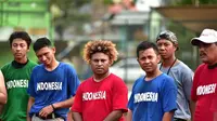 Pitcher timnas softball Indonesia, Nelwan Yumame (tengah merah). (Liputan6.com/Ahmad Akbar Fua)