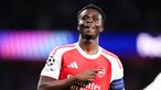 Pemain Arsenal, Bukayo Saka, melakukan selebrasi setelah mencetak gol ke gawang Atletico Madrid pada laga leg kedua semifinal Liga Champions di Stadion Emirates, Rabu (6/5/2026). (John Walton/PA via AP)