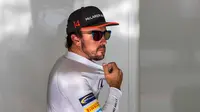 Fernando Alonso mengaku tak pernah menyesali keputusan hengkang dari Ferrari pada akhir 2014. (EPA/Srdjan Suki)