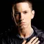 Eminem adalah rapper, penulis lagu, produser rekaman, dan aktor berkebangsaan Amerika Serikat. 