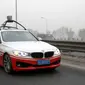 Mobil otonomos Baidu (BMW yang dimodifikasi) mengaspal di jalanan Beijing. Kredit: Baidu