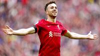 Pemain Liverpool Diogo Jota merayakan golnya pada pertandingan sepak bola Liga Inggris antara Liverpool dan Burnley di Anfield, Liverpool, Inggris, Sabtu 21 Agustus 2021. (Mike Egerton/PA via AP)