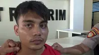 Viksal  alias Anjar (21), pria yang membunuh ibu hamil pakai tabung gas elpiji di Kendari.(Liputan6.com/Ahmad Akbar Fua)