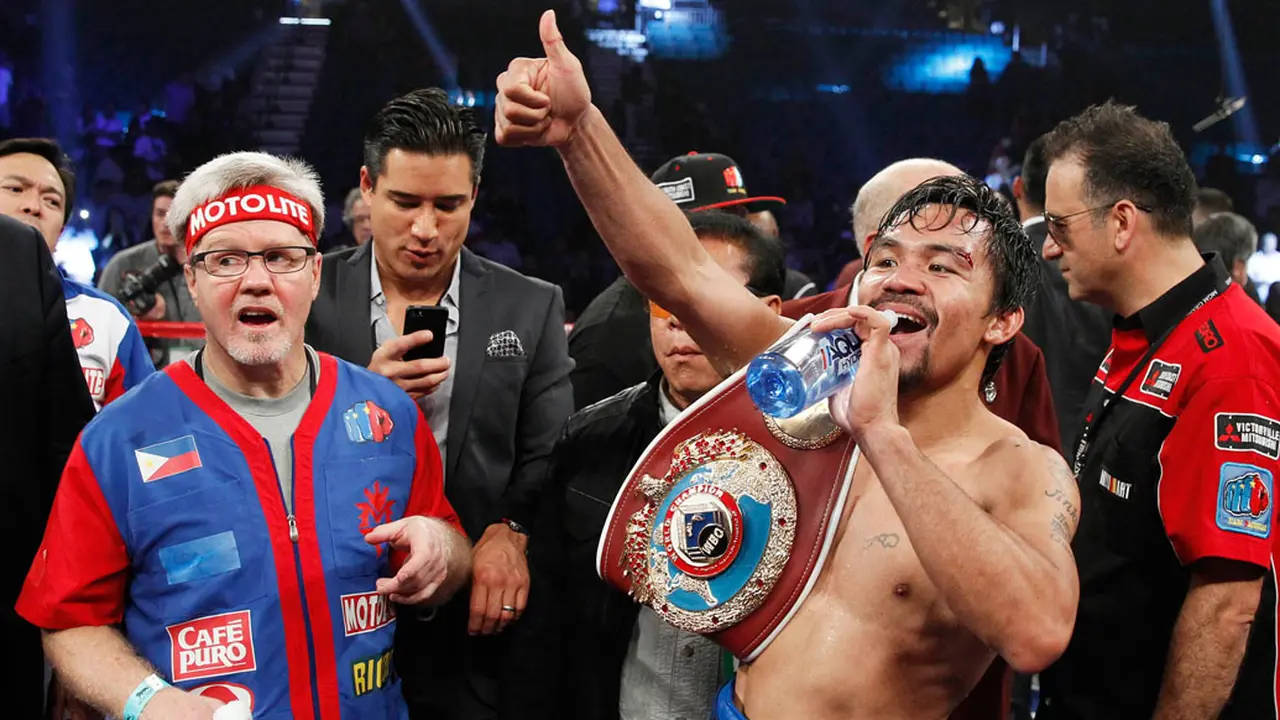 [FOTO] Manny Pacquiao Rebut Kembali Gelar Kelas Walter dari Bradley