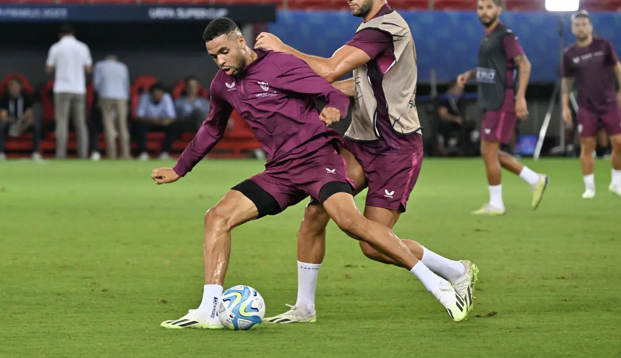 <p>Sementara itu, laga ini menjadi penampilan ketujuh Sevilla di ajang Piala Super Eropa, menyamai catatan AC Milan. (Louisa GOULIAMAKI / AFP)</p>