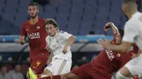 Real Madrid menelan kekalahan 4-5 dari AS Roma lewat adu penalti (skor 2-2), dalam laga terakhir pramusim di Stadio Olimpico, Minggu (11/8/2019). (AP Photo/Gregorio Borgia)