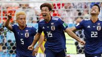 Timnas Jepang merayakan gol yang dibuat Yuya Osako ke gawang Kolombia di Piala Dunia 2018. (Jack GUEZ / AFP).