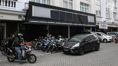 Suasana markas besar DPP Hizbut Tahrir Indonesia (HTI) di Jakarta, Kamis (20/7). Kementerian Hukum dan HAM (Kemenkum HAM) secara resmi telah mencabut status badan hukum organisasi kemasyarakatan HTI.(Liputan6.com/Faizal Fanani) 