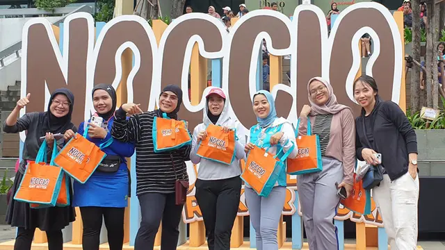 Rekor MURI Pembagian 11.111 Roti Tawar yang Dioles Peanut Butter NOCCIO di CFD Jakarta