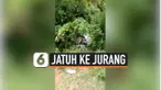 MOBIL BERISI SATU KELUARGA JATUH KE JURANG