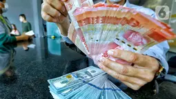 Rupiah Melemah Hampir Sentuh 18.000 per Dolar AS, Pasar Cemas