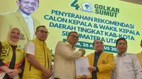 Asri Ludin Tambunan-Lom Lom Suwondo secara resmi telah menerima B1 KWK dari Partai Golkar