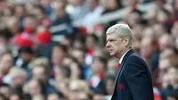 Ekspresi pelatih Arsenal, Arsene Wenger, setelah membawa timnya meraih kemenangan 4-0 melawan Watford, Sabtu (2/4/2016). (EPA/Andy Rain)